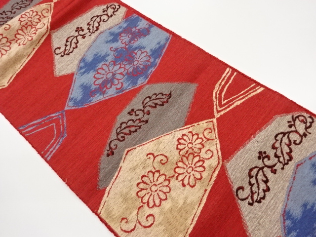 手織り紬多角形に菊唐草模様織出し名古屋帯